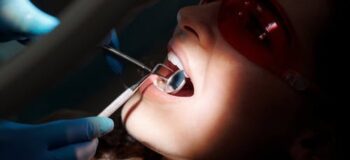 What Is the Difference Between Invisalign and Dentures?